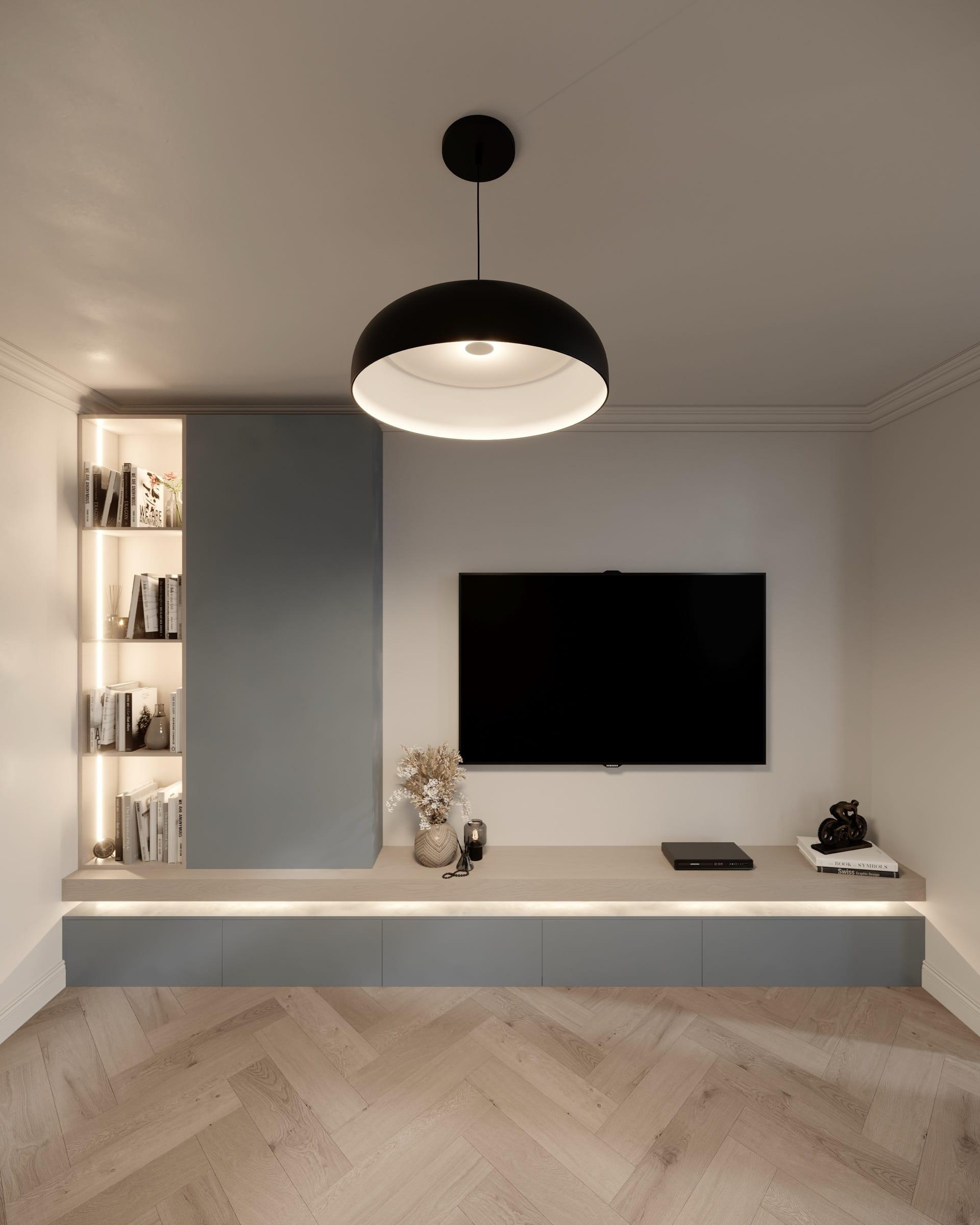 Living-room media wall in fitted joinery — backlit open shelving, a low handleless cabinet run and herringbone oak flooring