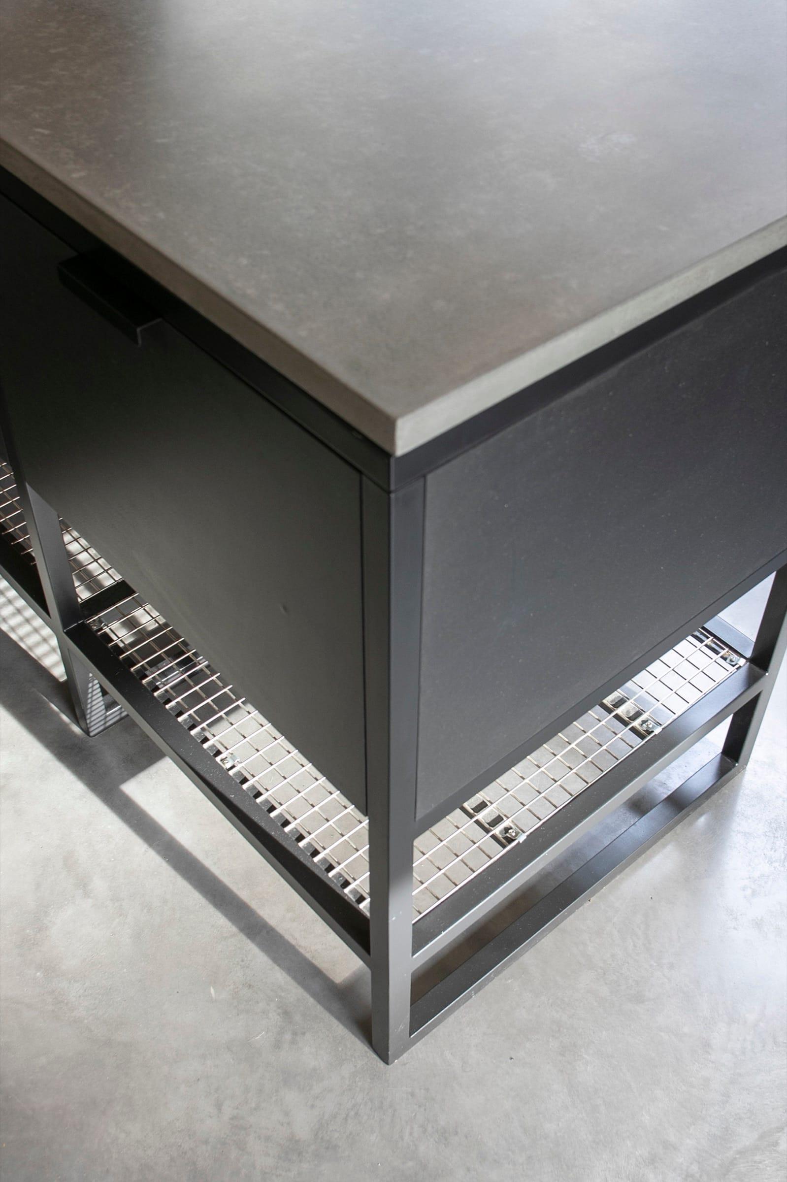 Concrete worktop on a welded steel frame, seen from below