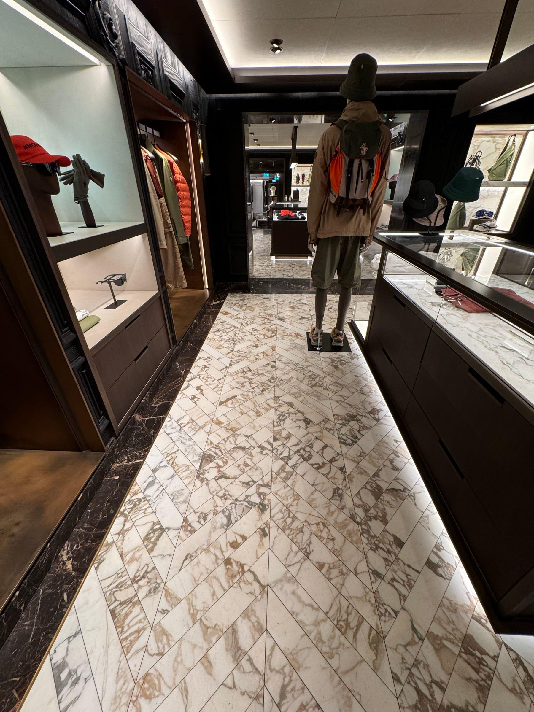 Retail interior — marble flooring running between joinery display walls