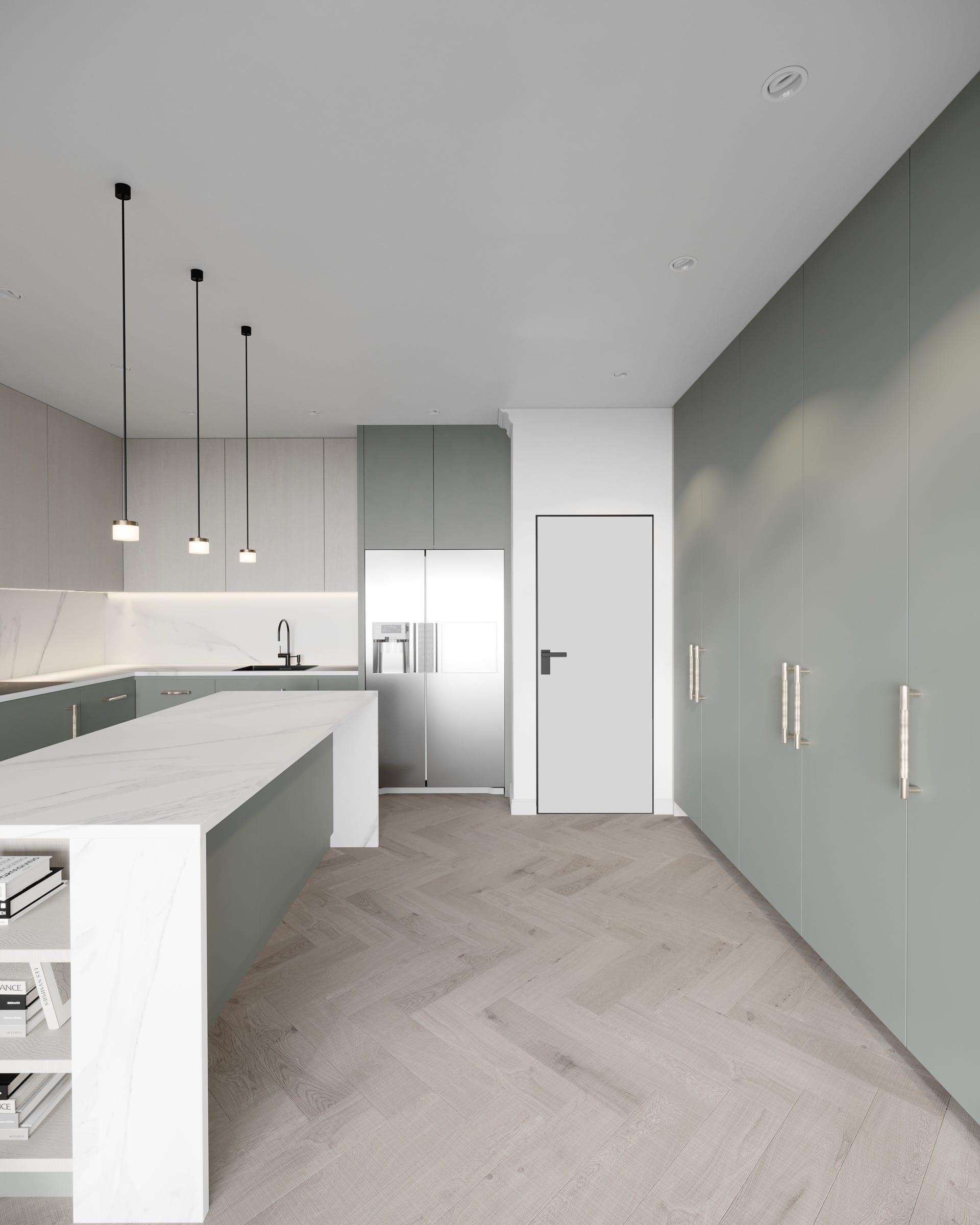 Kitchen with sage tall units, a marble island, slim pendants and herringbone flooring