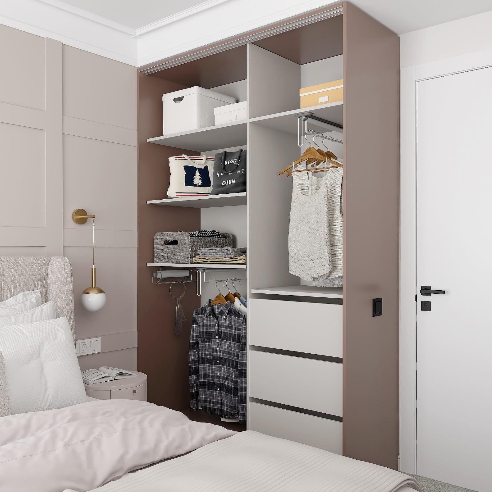 Fitted wardrobe interior — hanging rail, adjustable shelves and a drawer stack