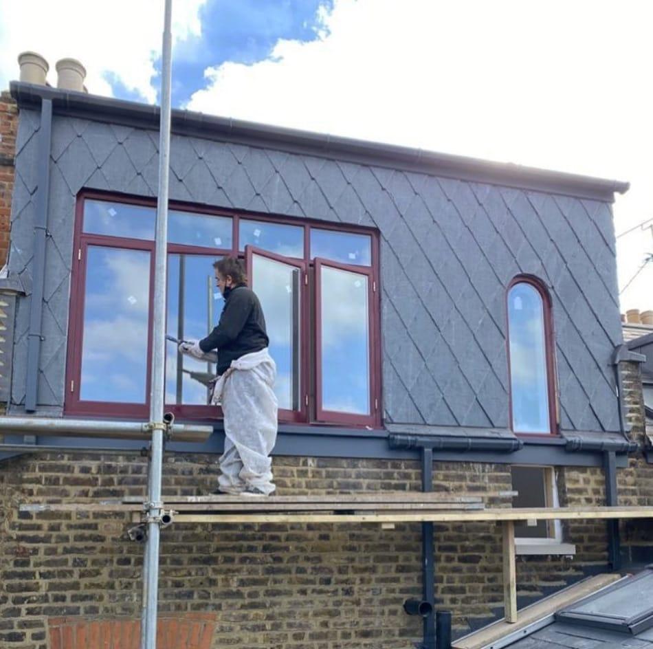 Slate-clad dormer with new timber windows on the rear roof slope — Fieldway Crescent loft conversion, Norbury SW16
